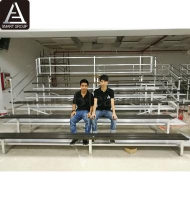 China Tip-N-Roll Aluminum Alloy 6061-T6 Portable Indoor Gym Bleachers Aluminum Sports Bleachers for sale