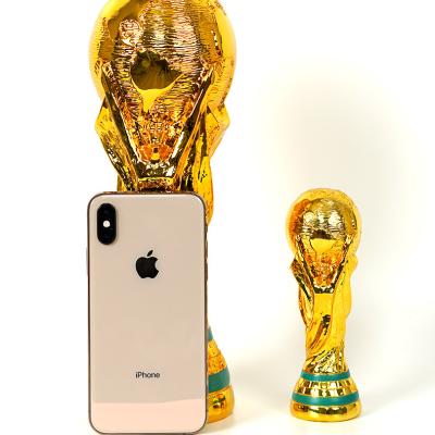 China 2022 Hot Sale Wholesale Resin Qatar World Cup Soccer Trophy World Globe Metal Resin Soccer Trophy for sale