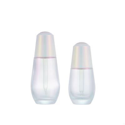 China Luxury Muti-color 30ML 50ML Push Button Dropper Press Luxury Glass Bottle Essential Oil Bottles With Dropper for sale