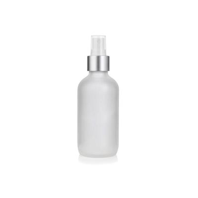 China Matte Frosted Boston Round 4oz Aluminum Glass Pump Bottle With Aluminum Pump for sale