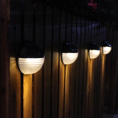 China Solar Powered Outdoor Waterproof Garden LED Wall Mount Light Garden Yard Fence Lamp Corrugated Solar Wall Spotlight Barrier Lights for sale