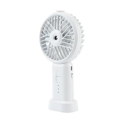 China 2 Spray Electric Handheld Portable Fan In 1 Humidifier And Fan Wholesale Adjustable Wind Speed ​​2021 Mini for sale