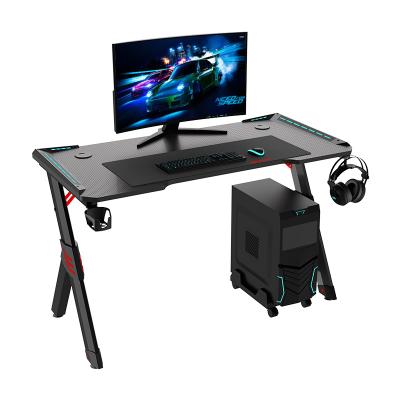 China Hot Selling Factory Direct Expandable RGB Game Table E-sport PC Desk Home Office With LED Light R-shape Gaming Desk 120mm for sale