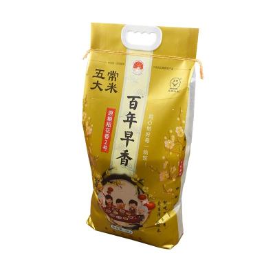 China Moisture Proof China Suppliers Custom Flat Bottom Pouch Rice Food Plastic Packaging Plastic Rice Bag With Handle for sale