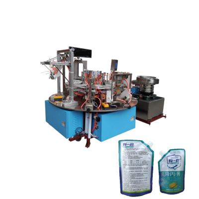 China automatic 3-sides sealing bags stand up spout pouch bag making machine for honey filling for sale