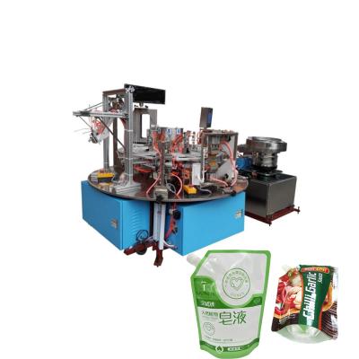 China colorful 3-sides bags baby food spout pouch packaging sealing bag making machine equipment with reclosable zipper for sale