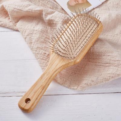 China Custom Logo Cushion Durable Oval Paddle Bamboo Straighten Women Men Scrape Massage Hairbrush Cushion Bamboo Hair Brush For Natural Hair for sale