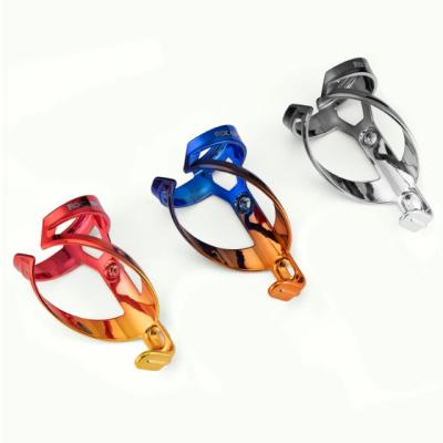 China Lightweight Colorful Bike Bottle Cage Carbon Fiber Bottle Cage Eletroplating Drinks Water Bottle Holder for sale