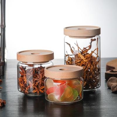 China Hot Sale Household Kitchen Refrigerator Storage Stocked Glass Spice Jars With Bamboo Lid for sale