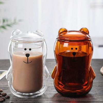 China 300ml Viable Cute Stereo Heart Bear Double Coffee Juice Milk Glass Cup With High Temperature Resistant Lid for sale