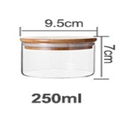 China Microwavable High Borosilicate Glass Jar With Lid 6oz Glass Jar With Bamboo Lid Safety Lead Free Glass for sale