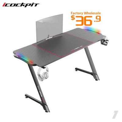 China (Other) Saitu New Design Gaming Computer Desk Game Table Adjustable Cool Model Black Gaming Desk With LED Lights for sale