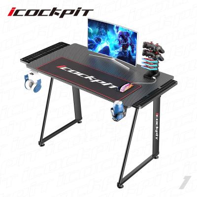 China Black Expandable Hot Selling Amazon Icockpit Physical Channels Gaming Computer Desks Table Home Office Black Computer Gaming Desk With Metal Frame For Sale for sale