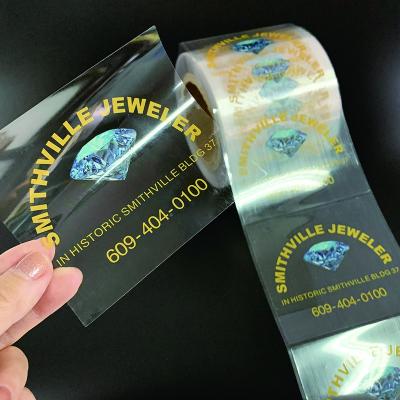 China Custom clear bopp waterproof direct logo manufacturing adhesive label roll up sticker custom transparent printing for bottle for sale