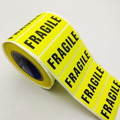 China 2X3 Inch Self Adhesive Yellow Matte Laminated Warning Labels Roll Customized Fragile Sticker Strong Adhesive For Shipping Boxes for sale