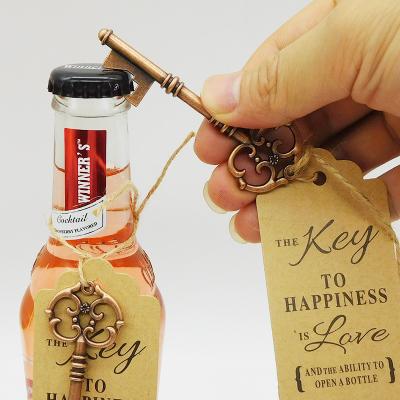 China Customized Golden Special Event Wine Opener Wedding Souvenirs For Guests With Label Ribbon for sale