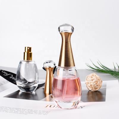 China Portable Ru Star Latest Design Elegant Thick Base 30ml Cosmetic Packaging Glass Bottle With Caps for sale