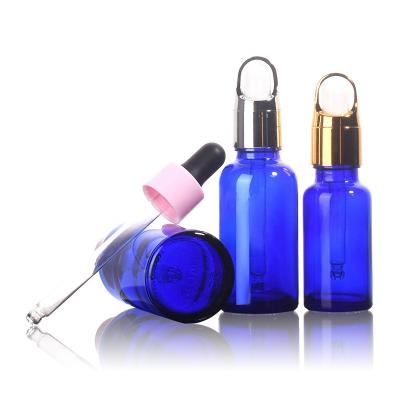 China Cosmetic Ru Star Custom Elegant Sapphire Blue Green Pink 10ml 20ml 30ml Essential Oil Cosmetic Packaging Glass Bottle With Dropper for sale