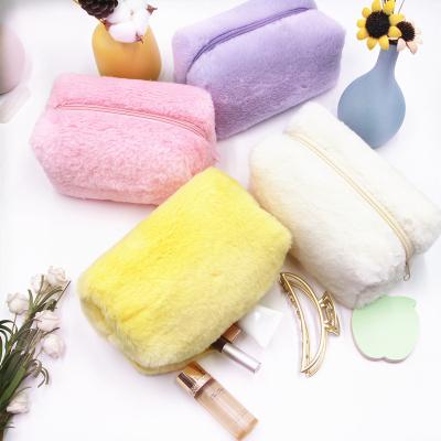 China Lady Wholesale Custom Soft Plush Travel Toiletry Makeup Pouch Women Furry Zipper Cosmetic Bag With Logo Faux Fur for sale