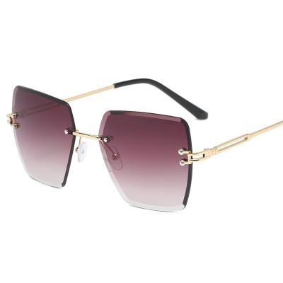 China Hot Sale New Design Rimless Fashion Oversized Square Rimless Sunglasses 2021 Women Vintage Gradient Shades Sun Glasses for sale