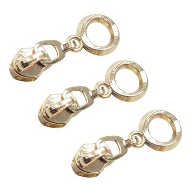 China Other Best Selling HVV Non Lock Puller Gold Plating Fancy Nylon Zipper Slider China for sale