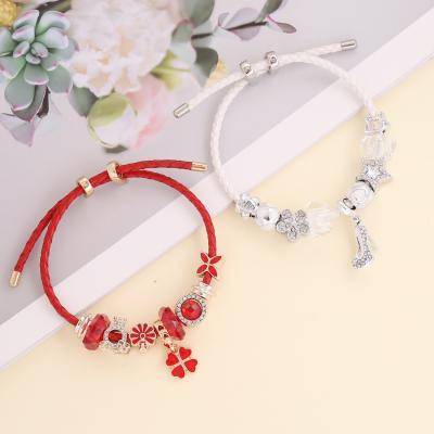 China FASHIONABLE Vintage Leather Bracelet Personalized Flower Charm Bracelet Women's Fashion Light Luxury Adjustable Woven Bracelet for sale