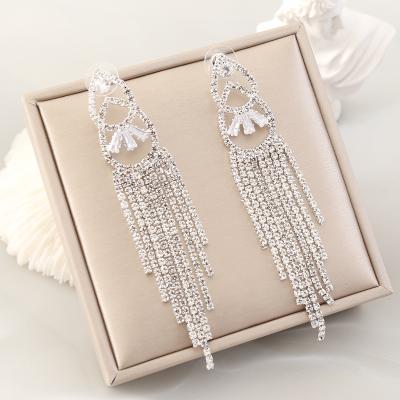 China TRENDY Women's Long Rhinestone Tassel Earrings Fashion Trendy Stud Earrings for sale