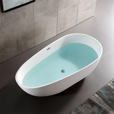 China Luxury Artificial Freestanding Bathtub Stone Egg Shaped Bathtubs Custom Size Solid Outdoor White Freestanding Bathtub For Adult for sale