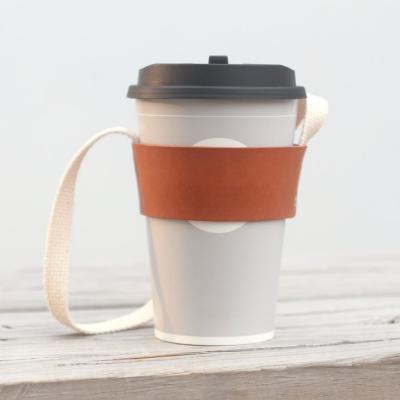 China Custom Leather PU Coffee Beverage Cup Bag Sustainable Cup Holder Sleeve Popular Leather Cup Sleeves for sale