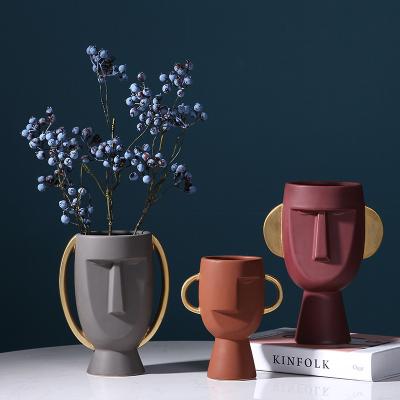 China Custom Nordic modern ceramic home ceramic flower vase Over-glazed China factory decor abstract human face for sale