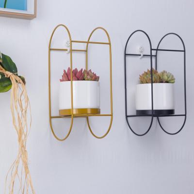 China ECO-frendly Modern Custom Gold Iron Black Frame for Planting Flowers and Plants Plants Pot Ceramic Hanging Vase for sale