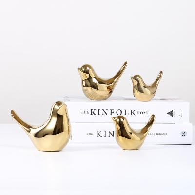 China Nordic Modern Porcelain Home Gold Sculpture Figurine Decoration Table Bird Statue Ceramic Glazed Ornaments for sale