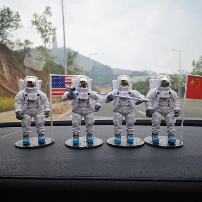 China Creative Europe Latest Design Personality Astronaut Boy Gift Car Decoration Ornaments Plastic Crafts for sale