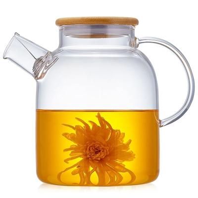 China WITH LID Wholesale Handmade Glass Jug Flower Teapot Kettle High Temperature Resistant Cold Drinking Glass Water Pitcher With Bamboo Lid for sale