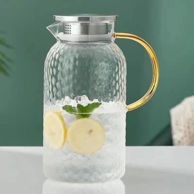 China Newly Designed Sustainable Pyrex Glass Water Pitcher With Lid Heat Resistant Water Jug For Tea And Juice Beverage Ice Hot/Cold Water for sale