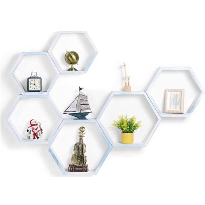 China Storage Wooden Shelf Hexagonal Honeycomb Wall Mounted Shelf For Living Room Office for sale