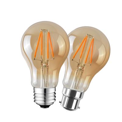 China Vintage Edison Bulbs 8W 800Lm B22 E26 E27 Vintage Edison A60 Led Bulb Amber Gold Glass Led Bulb Filament for sale