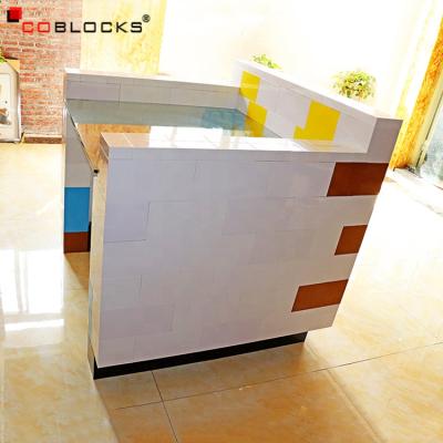 China Modern Consize Campaign / Customize Front Reception Counter Lobby Great Than Size Plastic PE Reception Building Block for sale