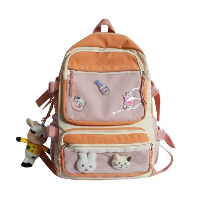 China Large Capacity Anti-theft Multiple School Bags Middle Student PVC Cute Student Backpack Bag With Cute Pendant for sale