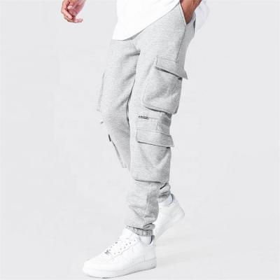 China Anti-wrinkle Loose Baggy 4 Pockets Cargo Bottom Pants Pockets Cargo Pants Custom Cotton Blend Wide Leg Stacked Sweatpants Men for sale