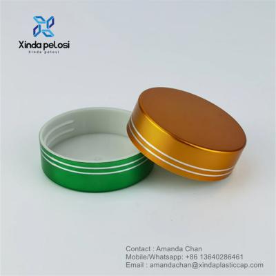 China Colorful Aluminum Plastic Lids For Cosmetic Bottle Cap Shiny Screw Cover for sale