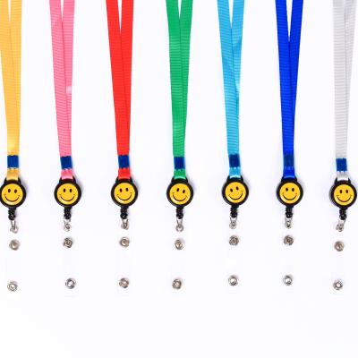 China Advertising Quality Hot Wholesale Expansion Buckle Smile Face ID Card Telescopic Rope Lanyard for sale