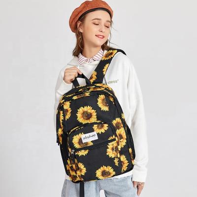 China Waterproof Girls Backpack Galaxy Sunflower Floral Print Women Casual Large Capacity Carry On Cute Backpack Travel Backpack Manufacturer for sale