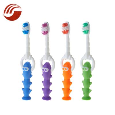 China Daily Use Custom PP Handle Cheap Eco Kids Toothbrush With Suction Stand for sale