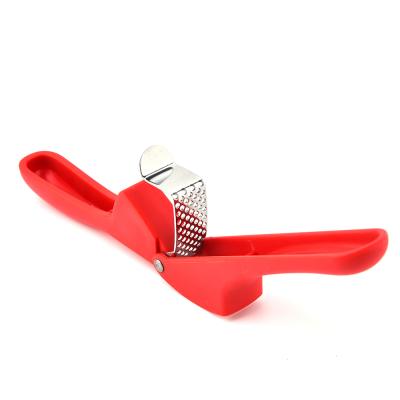 China Kitchen Accessories Garlic Press Grater Crusher Stainless Steel Meat Grinder Crusher Roll Peeler for sale