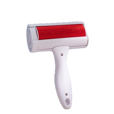 China Ergonomically Stocked High Sales Rollers Comfortable Cleaning Grooming Freely Rotating Massage Pet Brush Remover for sale