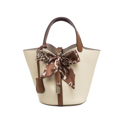 China Waterproof 2022 PU lady bags vintage designer wholesale leather outdoor shopping handbags with ribbon for sale