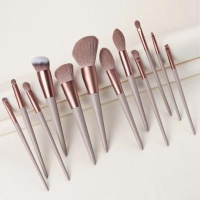 China Soft stiffens amazon 12pcs hot sale synthetic pink hair makeup brush set with custom logo for sale