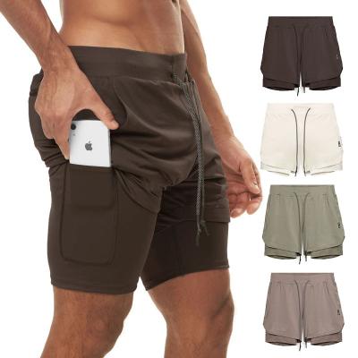 China 2021 New Men's Color Matching Double-Layer Hanging Towel Fitness QUICK DRY Running Breathable Sports Shorts for sale