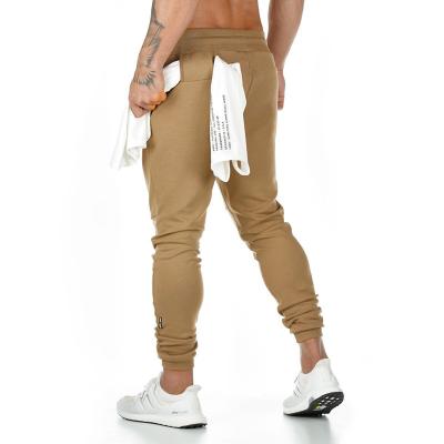 China Hot Selling QUICK DRY Hot Selling Korean Style High Quality Design Gym Spandex Skinny Slim Pants Jogging Men's Sports Pants for sale